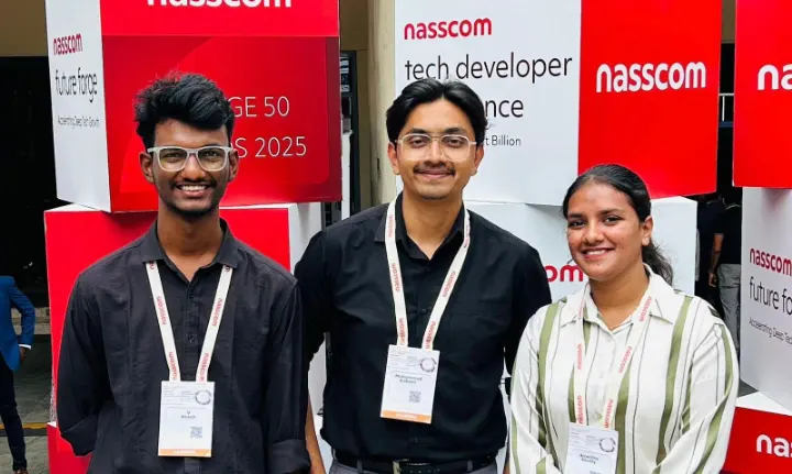 Three team members at a nasscom event