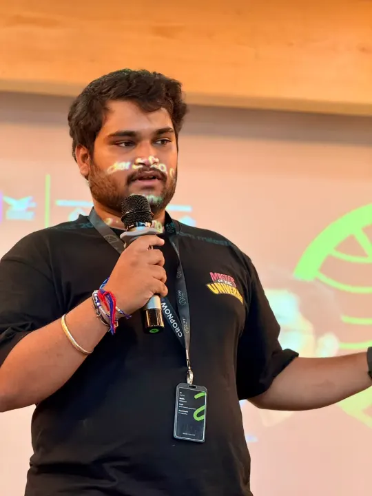 A team member speaking into a microphone